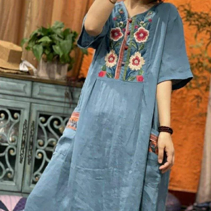 Embroidered loose short-sleeved mid-length linen dress - product detail image 1 by TRANSION