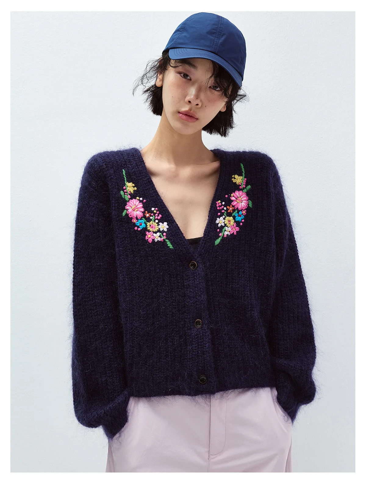 Navy V-neck knit cardigan with colorful floral embroidery