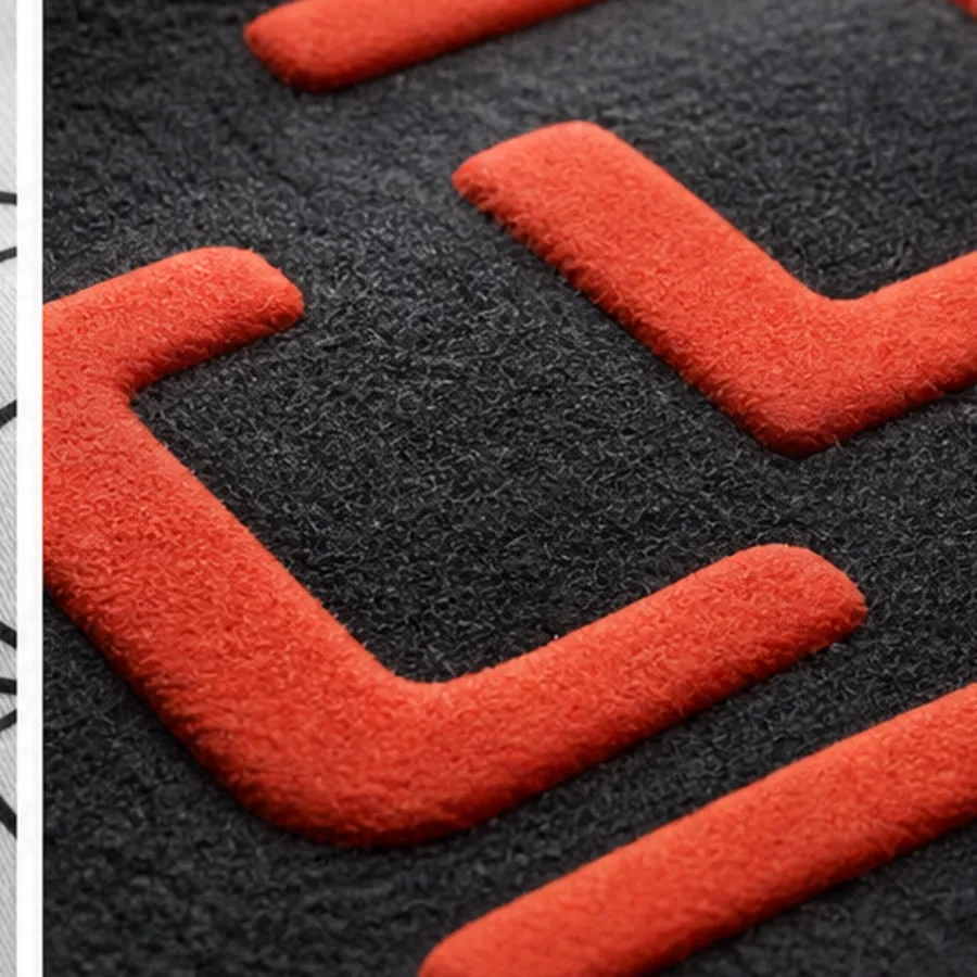 Raised red puff printing on dark sweatshirt fabric